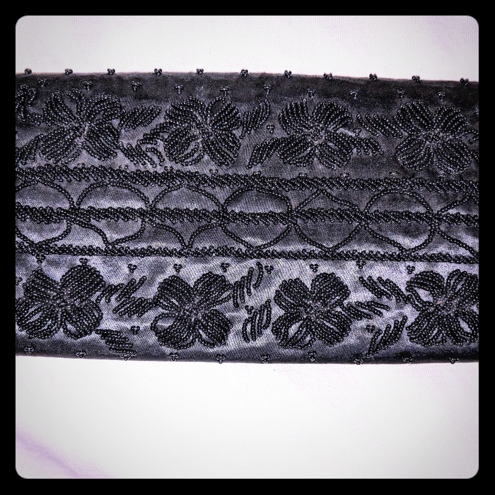 Hand beaded clutch